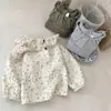 Estilo coreano de primavera Ropa nueva para niños Ropa para bebé niña Manga larga floral Cuello de loto Camiseta base floral Top con cuello de muñeca