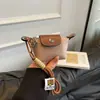 Mini Bolsas Pequeñas Transfronterizas para Mujer 2025 Nuevo Modelo Bolsa para Labial Auriculares Bolsa Tipo Dumpling Estilo Coreano Cartera Personalizada Al por Mayor
