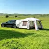Parrilla de camping plegable portátil a prueba de viento para exteriores con recubrimiento negro engrosado para protección solar y contra la lluvia, adecuada para acampar durante la noche y con mosquitero.
