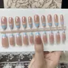 Éxito de ventas de verano: Manicura francesa en tono nude con baño de oro, diseño de concha 3D, uñas postizas con acabado de estilo de lujo ligero.