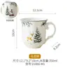 Juego de vajilla de cerámica navideña estilo bosque con temática invernal, con diseños de muñeco de nieve, renos y florales, que incluye platos, tazones y tazas de café, perfecto para uso festivo en el hogar.