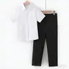 Conjunto de Camisa Branca de Manga Curta Infantil Uniforme Escolar Primário para Performance de 1º de Junho Competição Esportiva Uniforme de Classe Fabricante de Camisa Branca Em Estoque