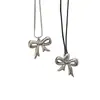 Sombra suave y delicada, collar con lazo de cordón de cuero, estilo fresco y minimalista, cadena para suéter, sensación de lujo ligero y alta gama, venta al por mayor de collares