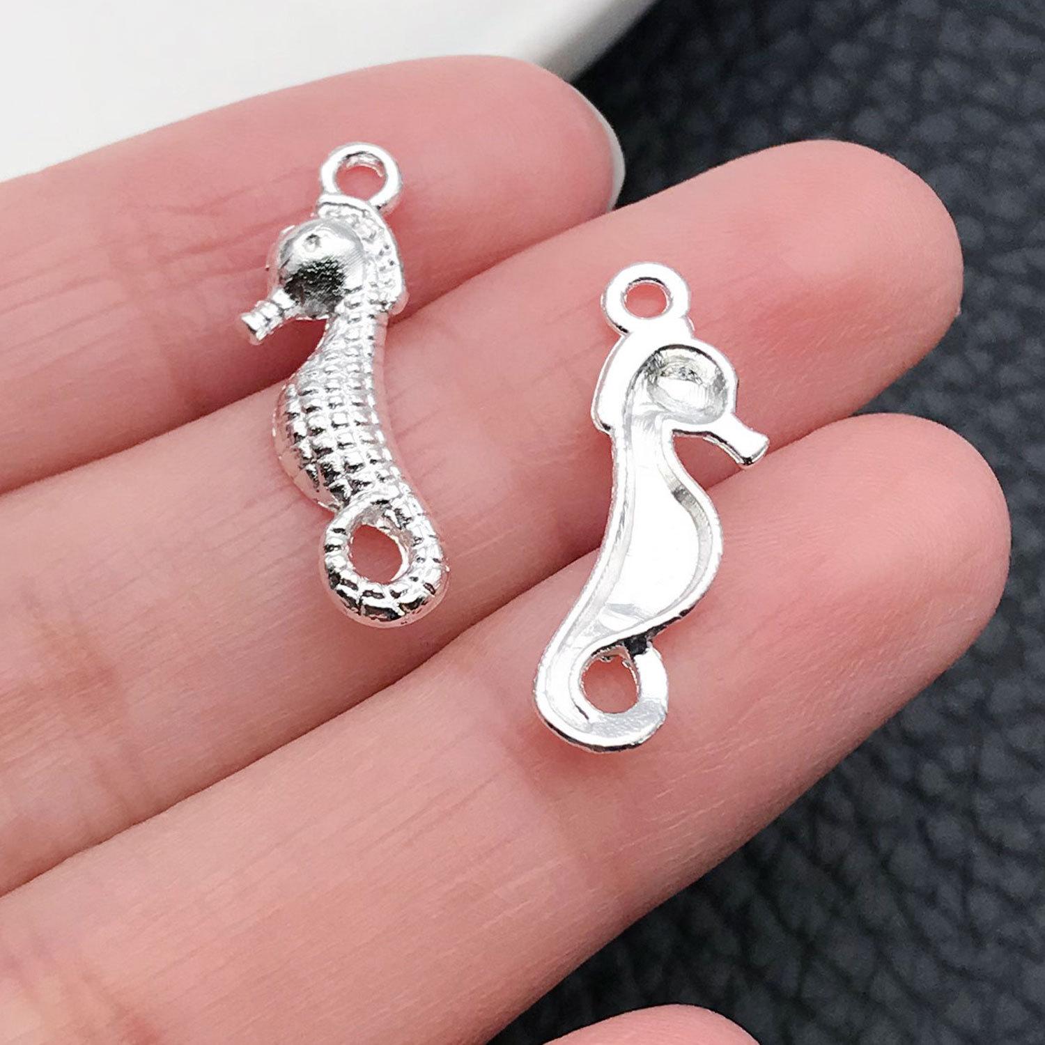 20700-M-亮银锌合金海洋海马23x7mm-0.5g.j