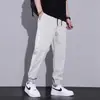 Pantalones de seda de hielo para hombre de verano estilo delgado moderno combinable pantalones casuales holgados deportivos de secado rápido harem leggings de nueve puntos