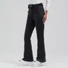 Pantalones de esquí profesionales de doble tabla para mujer, transfronterizos europeos y americanos, cortavientos, cálidos, impermeables, ajustados para exteriores, alta elasticidad para mujer