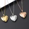 Bestseller transfronterizo acero inoxidable acabado espejo brillante lujo ligero forma de corazón caja de fotos collar que puede contener fotos
