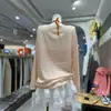 Camiseta de manga larga a rayas de gasa, una prenda de verano elegante y nueva para mujer, que ofrece protección solar y un corte holgado y cómodo, perfecta para viajar