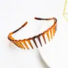 Faixa de cabelo coreana simples cor de casco de tartaruga onda com dente antiderrapante faixa de cabelo comércio exterior venda quente material PC lavar rosto fivela de cabelo acessórios de cabelo