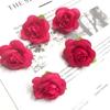 Tela de seda de simulación directa de fábrica 4cm Cabeza de rosa con hoja rosa pequeña accesorios de producción DIY flores decorativas para boda