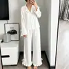 2026 exclusivo transfronterizo conjunto de dos piezas de ropa de casa europea y americana con cordones volantes manga larga pantalón largo pijamas de satén de seda helada para mujer