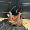 Bolsa de ombro única de cor sólida com nova textura transfronteiriça, bolsa de axila, mochila de grande capacidade moderna, bolsa tote alta e estilosa