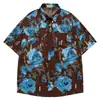 Camisa Retro Americana de Bloques de Color con Estampado Floral, Manga Corta, Hombros Caídos y Corte Holgado, Top Unisex de Moda Urbana al por Mayor
