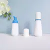 En stock botella cónica blanca de espuma de 60 ml, botella espumadora de PET para mousse de 100 ml, dispensador portátil de espuma facial