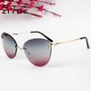 Nuevas Gafas de Sol Ojo de Gato sin Montura Transfronterizas Europeas y Americanas Moda Degradada Océano Gafas de Sol Gafas de Sol Decorativas Personalizadas