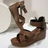 Sandalias romanas de estilo europeo y americano con plataforma gruesa y tira cruzada con hebilla para mujer, talla grande, tacón de cuña