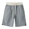 Pantalones Cortos de Seda Helada Holgados para Hombre Verano 2025 Delgados Casuales de Secado Rápido con Malla Pantalones de Playa Ropa de Trabajo Pantalones Cortos Deportivos