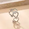 Anel aberto de aço inoxidável mais vendido internacionalmente, aço titânio, não desbota, joia de mão simples, anel de amor oco por pressão de óleo, fábrica