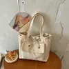 Nova bolsa de mão simples estilo coreano para mulheres, bolsa tote de lona, resistente ao desgaste, bolsa de ombro de grande capacidade para estudantes universitários, adequada para o dia a dia