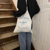 Ofr Paris Paris livraria periférico versátil francês simples letra bolsa de ombro fina bolsa de tecido cinza bolsa feminina