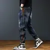 Jeans masculinos vintage para comércio exterior primavera e outono, calças cargo patchwork estilo americano da moda, corte solto, calças jogger casuais versáteis da moda