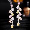 Pendientes de aguja de plata s925 de ambiente exagerado de alto sentido para mujer temperamento elegante europeo y americano nuevos pendientes largos de circonita en forma de corazón
