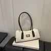 Outono de 2026 Nova Bolsa Ombro Versátil Estilo Francês para o Trabalho Bolsa de Mão Feminina Exquisita Bolsa Baguete Bolsa Feminina no Atacado