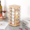Juego de botellas cuadradas de vidrio giratorias para condimentos Amazon transfronterizo con estante giratorio lote de frascos para condimentos de cocina