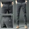 Calças casuais masculinas de alta qualidade de Hong Kong, calças sociais finas de perna reta para o verão, calças compridas da moda estilo coreano, confortáveis e versáteis
