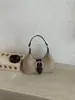 Bolso de gamuza de nicho súper popular, nuevo bolso cruzado para mujer otoño e invierno 2026, bolso de hombro y axila versátil vintage