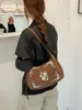 Nuevo bolso de axila bordado estilo chino para mujer, colección otoño/invierno 2026, bolso de hombro/bolso cruzado retro de gamuza con forma de media luna