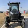 Trator de quatro rodas para comércio exterior transfronteiriço 1204 certificado CE com pá frontal e roda de trator escavadora rotativa