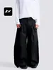 Con una rica hoja occidental curva simple retro americana para hombres y mujeres pantalones de pierna ancha diseño de pliegues holgados sentido de diseño corte tridimensional