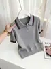 Camisa polo de venta caliente con bloques de color y rayas tejidas para mujer, nueva moda primavera-verano 2026, top de manga corta ajustado