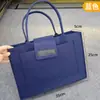 Nuevo Maletín de Fieltro Bolso de Mano Bolsa de Regalo para Viajes Diarios Gran Capacidad Bolsa de Fieltro Bolso Personalizado para Empresas Venta al por Mayor