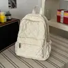 Mochila xadrez estilo coreano 2026 transfronteiriça, uma mochila diária de grande capacidade, leve e simples para estudantes do sexo feminino