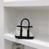 Armário de Bolsas Pequenas Produto Novo Primavera/Verão 2025, Bolsa de Mão Simples e Versátil, Bolsa de Jardim Elegante para Segurar na Mão, Bolsa Tote Transversal