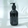 En stock botella de champú negra de 500 ml botella de plástico para gel de ducha con dispensador de 300 ml botella para acondicionador
