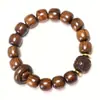 Venta al por mayor de fábrica pulsera de anillo corredizo con cuentas de pera amarilla de hoja grande pulsera de madera manualidad regalo rosario jugar fabricantes