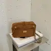Shuai Mijia 2026 Outono Novo Alta Aparência Textura Retrô Malha de Diamante Corrente Bolsa de Axila Feminina Ombro Único Transversal