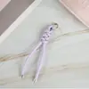 Moda Creativa de Moda Hebilla Colgante Nudo Peruano Cuerda de Cuero Tejido Accesorios Llavero de Coche Colgante para Bolso de Muñeca Venta al por Mayor