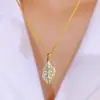 Collar de hoja para mujer, nicho de lujo ligero, versátil, rama dorada, colgante de hoja de jade, cadena de caja, moda para ir al trabajo, collar de circón galvanizado
