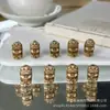 Hueso de Camello Amarillo Dios de la Fortuna Accesorio Creativo para Pulseras DIY, Cuentas Espaciadoras, Colgantes de Cuerda Trenzada y Decoración Versátil