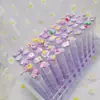 Pincel de mascara de tubo transparente de dibujos animados mezcla de colores mini de dibujos animados lindo independiente con tubo pincel de mascara de pestañas peine pequeño en stock