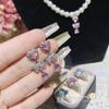 Camélia estilo coreano luz luxo brilhante oceano azul tesouro coração prata agulha brincos terno banhado a ouro 18K oito corações e oito flechas anel aberto