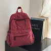 Mochila xadrez estilo coreano 2026 transfronteiriça, uma mochila diária de grande capacidade, leve e simples para estudantes do sexo feminino