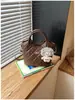 Bolso bandolera nuevo y moderno para el trabajo, bolso de mano, bolso tipo cubo de moda para primavera, bolso acolchado simple para mujer