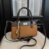 Bolso de mano de alta calidad estilo coreano para mujer, nuevo bolso de hombro casual de moda 2026, bolso cruzado tipo cubo elegante para el día a día
