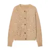 Primavera 2026 Nuevo Estilo Moda Femenina Estilo Europeo y Americano Simple Versátil Lentejuelas Cuello Redondo Tejido de Punto Manga Larga Top Color Puro