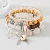Pulsera de tobillo con colgante de hoja hueca y grano de café estilo bohemio, pulsera de cuentas con cordón elástico multicapa, superventas transfronterizo